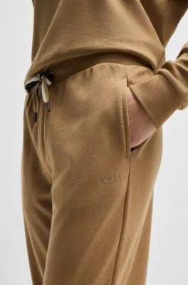 Cuffed tracksuit bottoms with signature-stripe drawcord