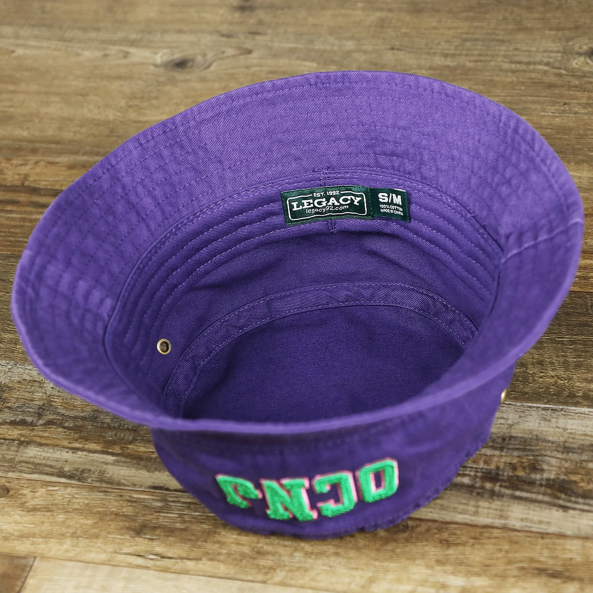 Green OCNJ Double Wordmark Pink Outline Bucket Hat | Purple Bucket Hat