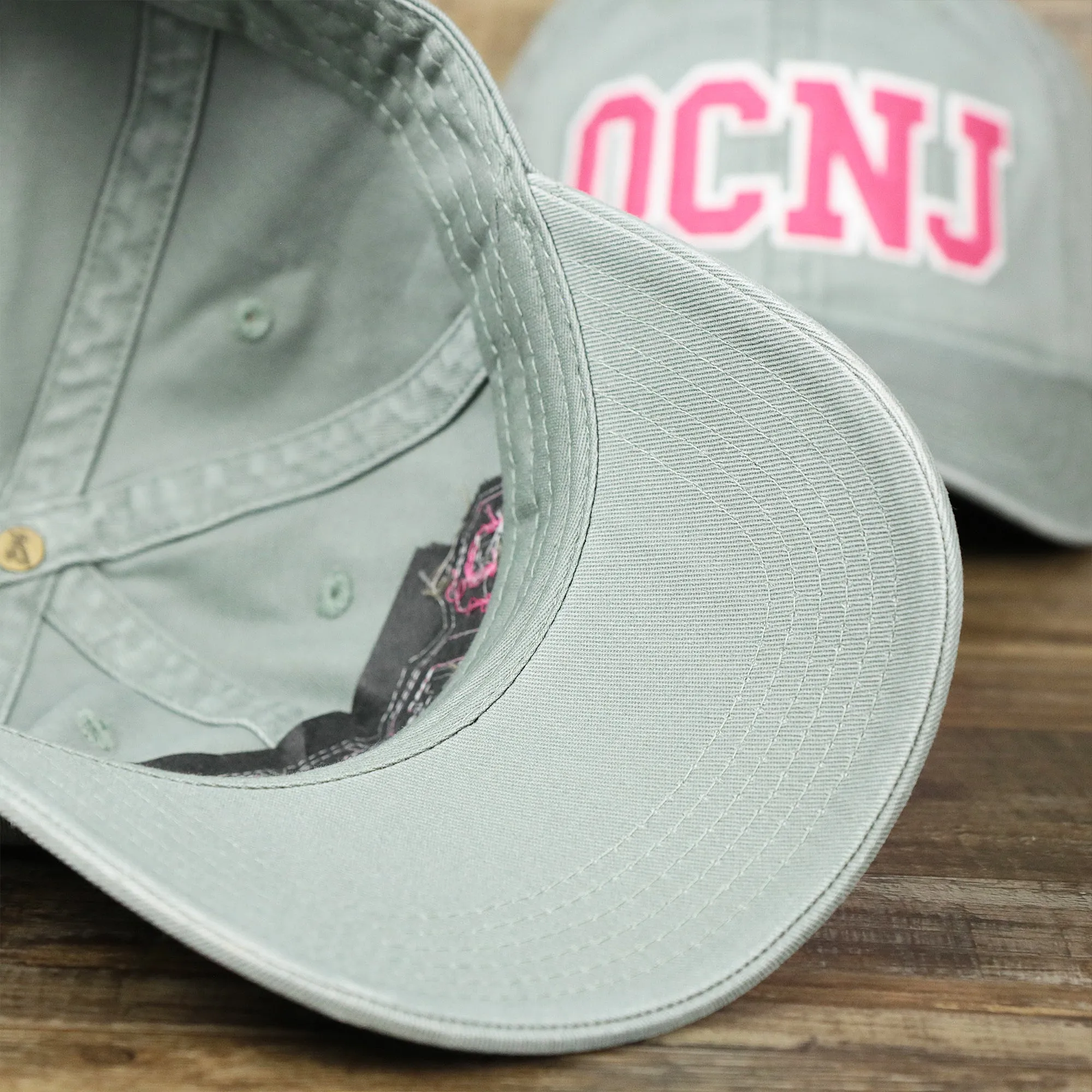 Pink OCNJ Wordmark White Outline Dad Hat | Sawgrass Dad Hat